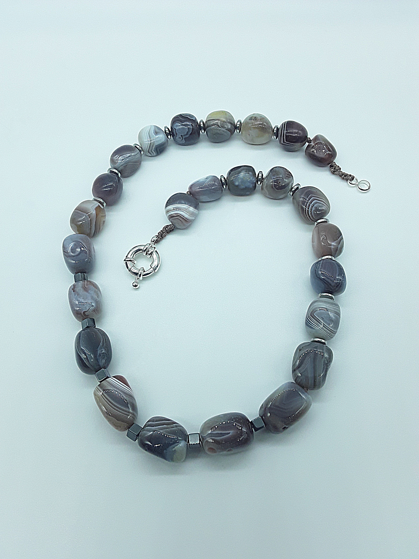 The Earth Horizon Necklace by Polmadeva – Botswana Agate and Hematite necklace inspired by ancient landscapes and grounded harmony.