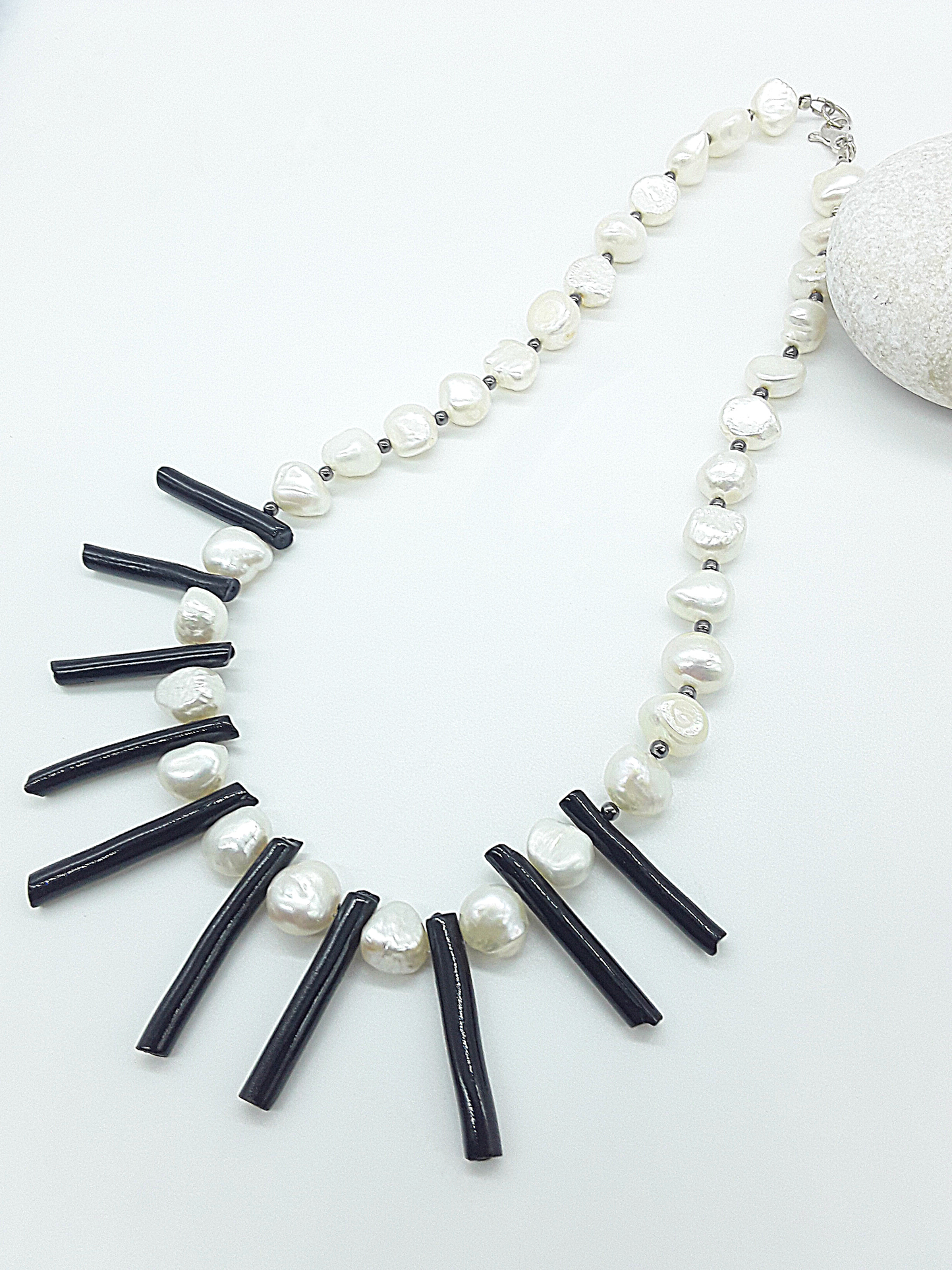 The Tidesong Necklace by Polmadeva – freshwater pearl, black coral and 925 silver necklace symbolizing elegance, strength, and balance