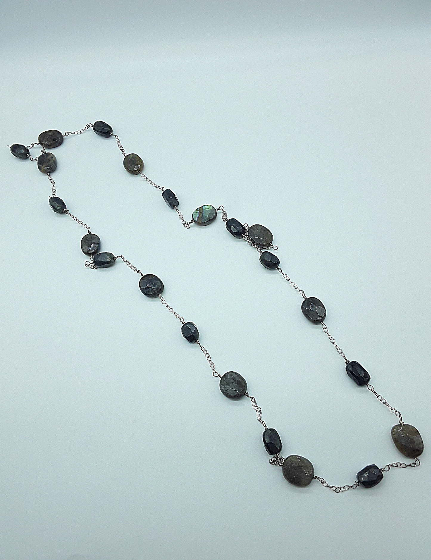 Infinity Dawn Necklace by Polmadeva – 100 cm labradorite and 925 silver necklace symbolizing renewal and elegance.
