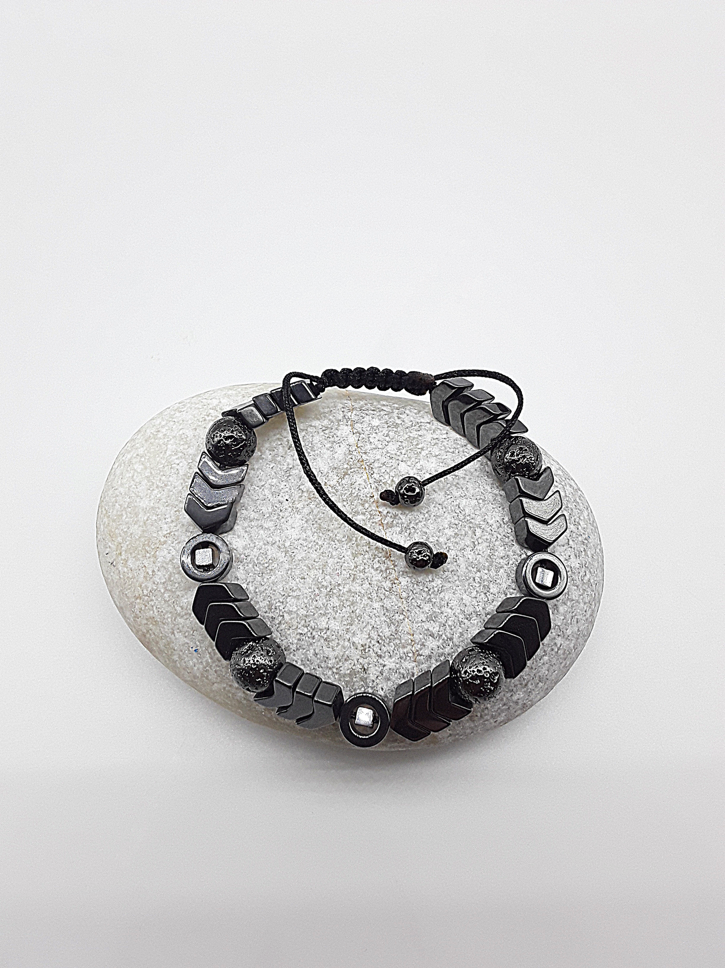 The Ash & Steel Bracelet by Polmadeva – hematite and lava stone bracelet symbolizing resilience, grounding, and rebirth