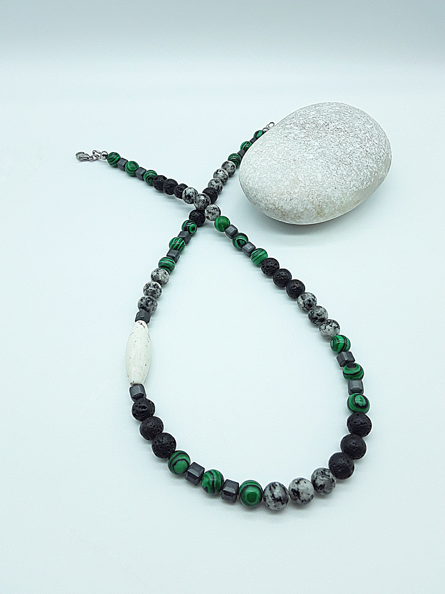 The Silent Strength Necklace by Polmadeva – malachite, lava stone, jasper, hematite and turquoise necklace symbolizing inner power, grounding, and resilience