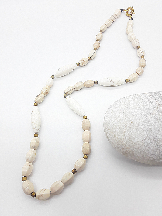 The Ivory Horizon Necklace by Polmadeva – Turquoise Ivory and Hematite necklace symbolizing simplicity, balance, and timeless strength.