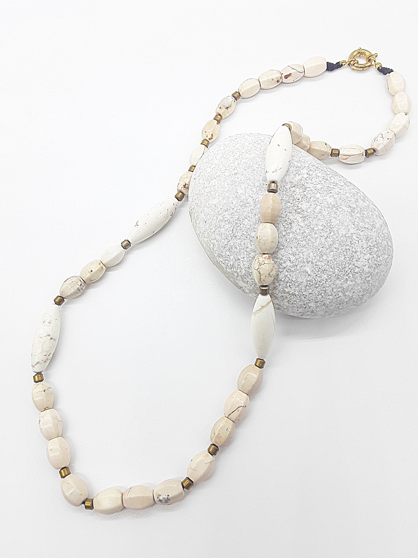 The Ivory Horizon Necklace by Polmadeva – Turquoise Ivory and Hematite necklace symbolizing simplicity, balance, and timeless strength.