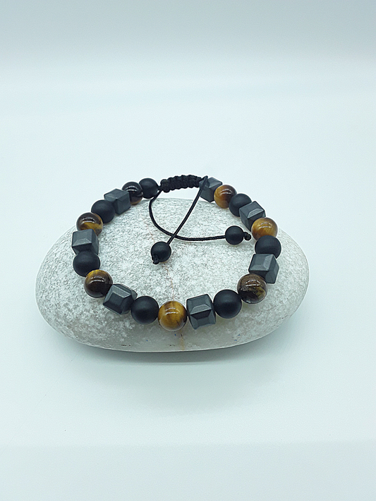 The Resolute Bracelet by Polmadeva – black onyx, hematite and tiger eye bracelet symbolizing courage, balance, and quiet strength