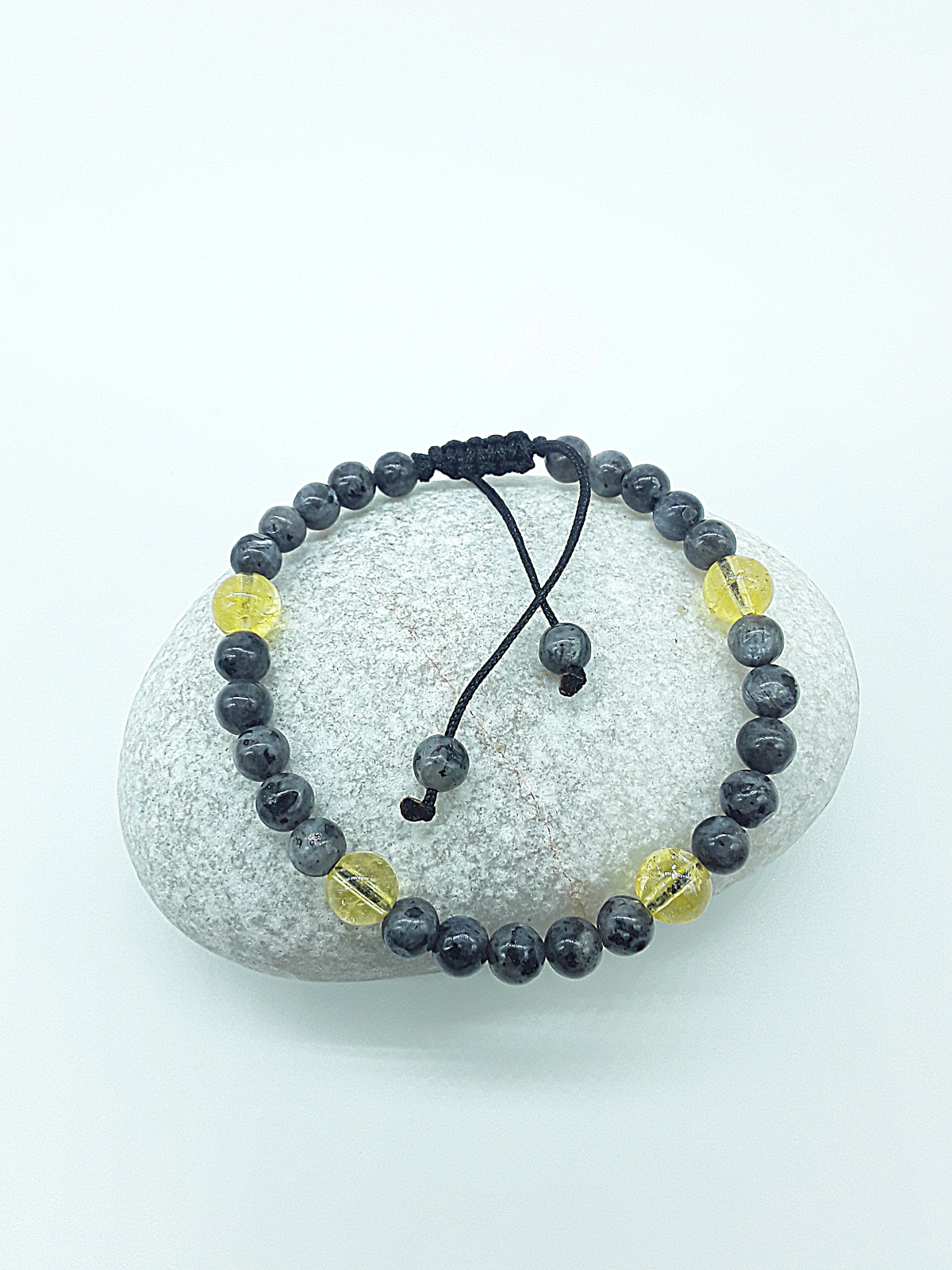 The Solar Veil Bracelet by Polmadeva – Labradorite and Citrine Crystal bracelet symbolizing balance, light, and transformation.
