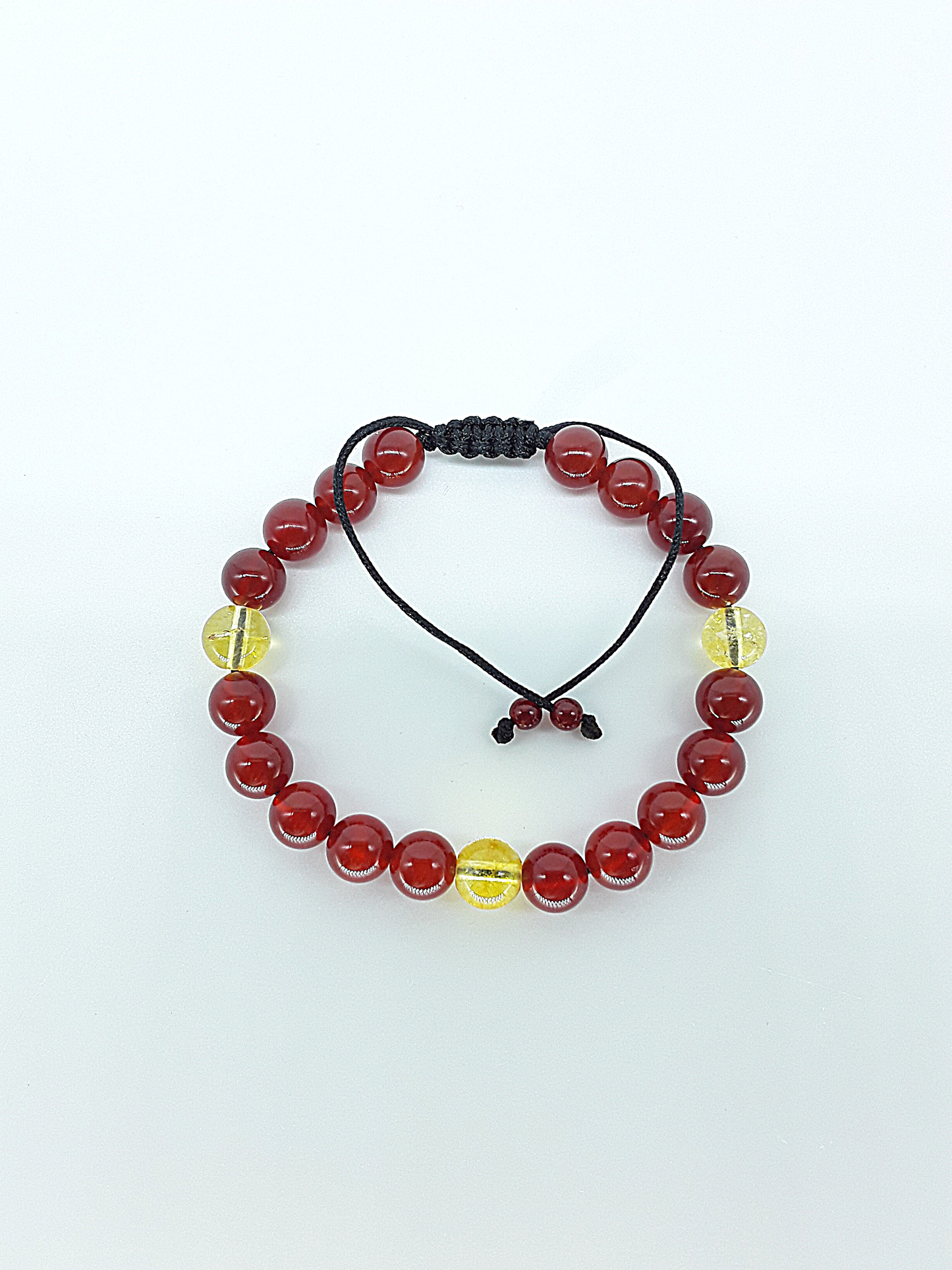The Flame of Grace Bracelet by Polmadeva – citrine and carnelian bracelet symbolizing courage, vitality, and graceful strength