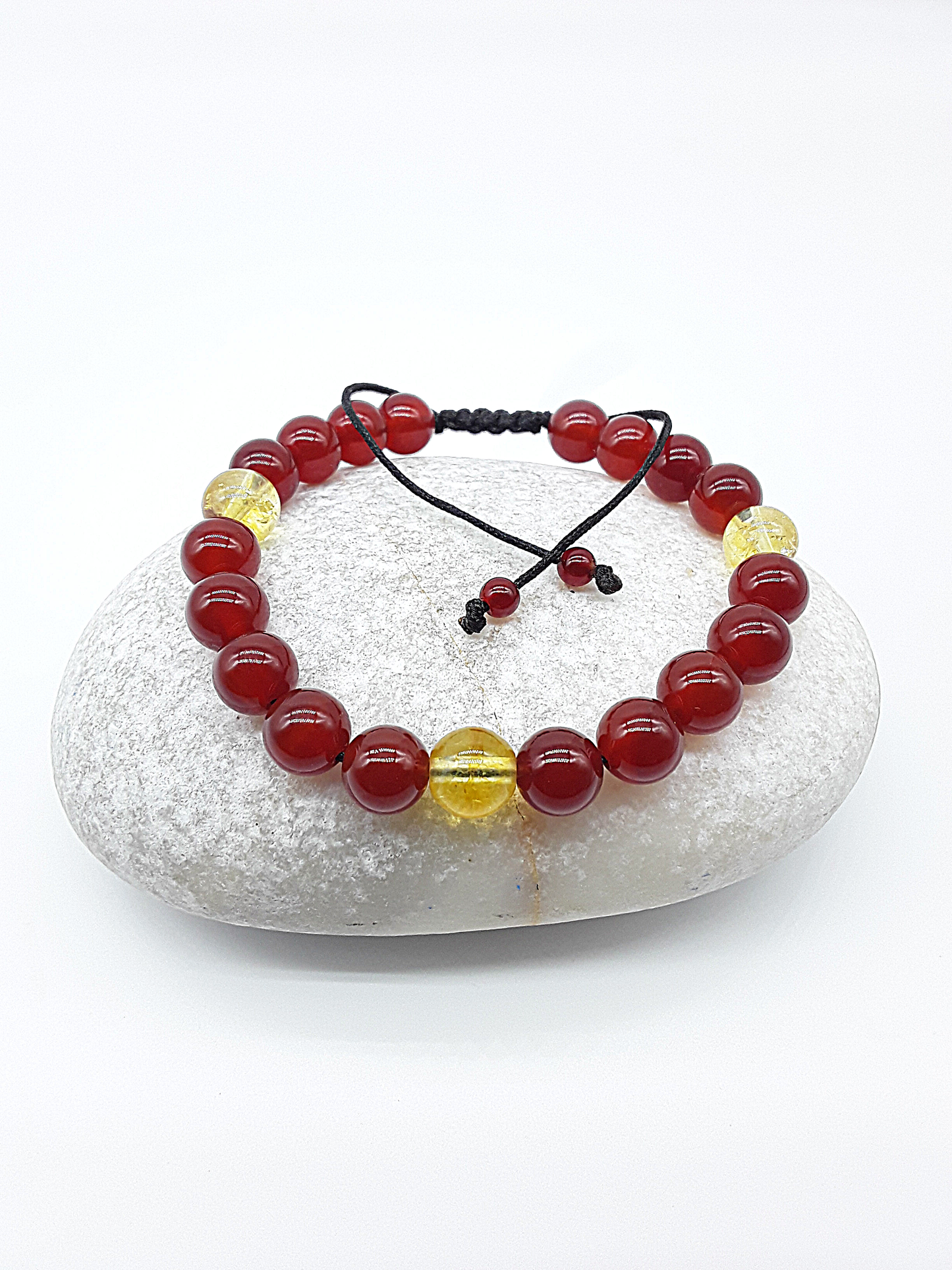The Flame of Grace Bracelet by Polmadeva – citrine and carnelian bracelet symbolizing courage, vitality, and graceful strength