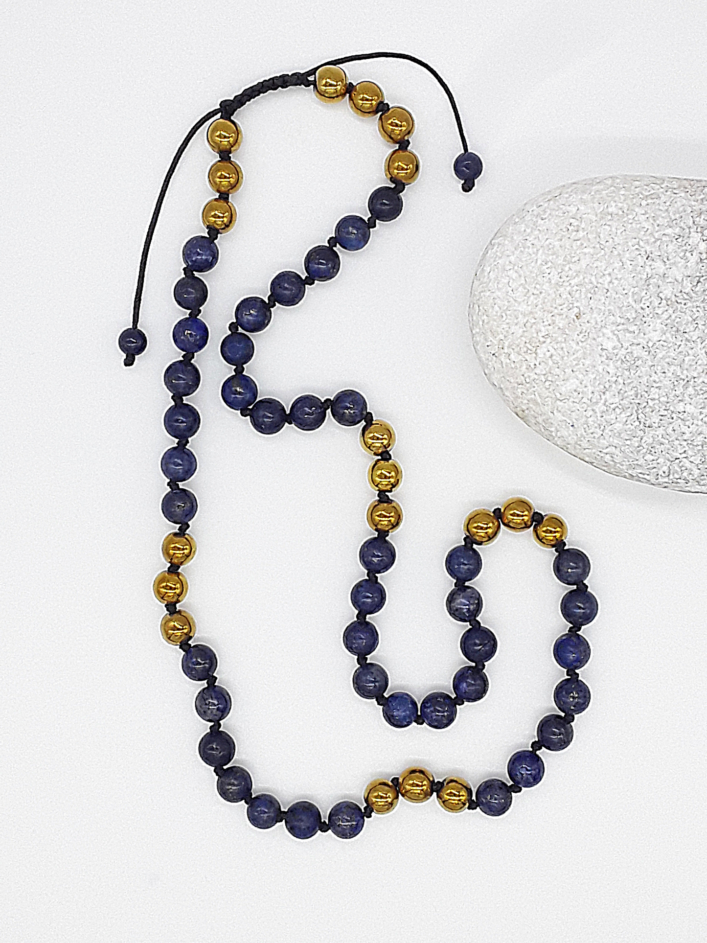 The Sacred Knots Necklace by Polmadeva – handcrafted Lapis Lazuli & Hematite necklace (8 mm), adjustable 60–80 cm. A talisman of vision, clarity & devotion.