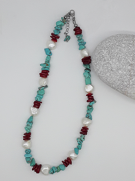The Ocean’s Renewal Necklace by Polmadeva – turquoise, pearl and red coral necklace symbolizing the ocean’s rhythm and renewal