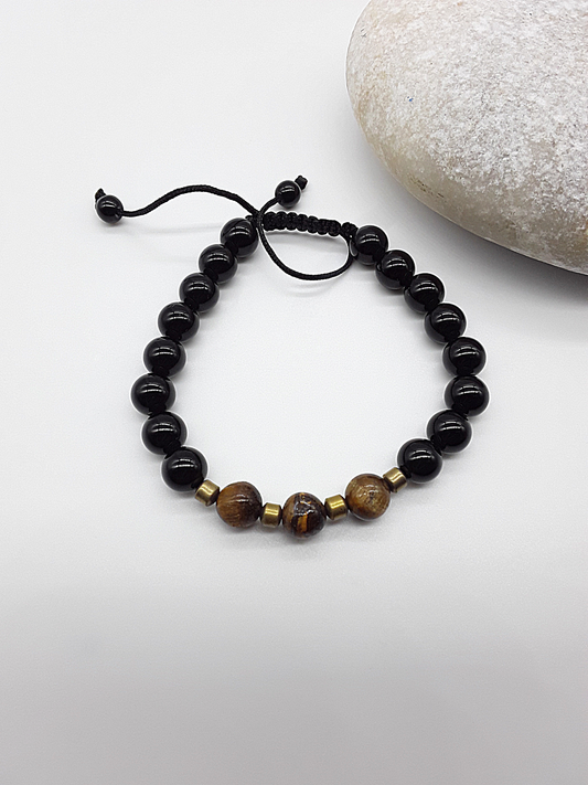 The Sentinel Bracelet by Polmadeva – black onyx, tiger eye and hematite bracelet symbolizing protection, balance, and quiet strength