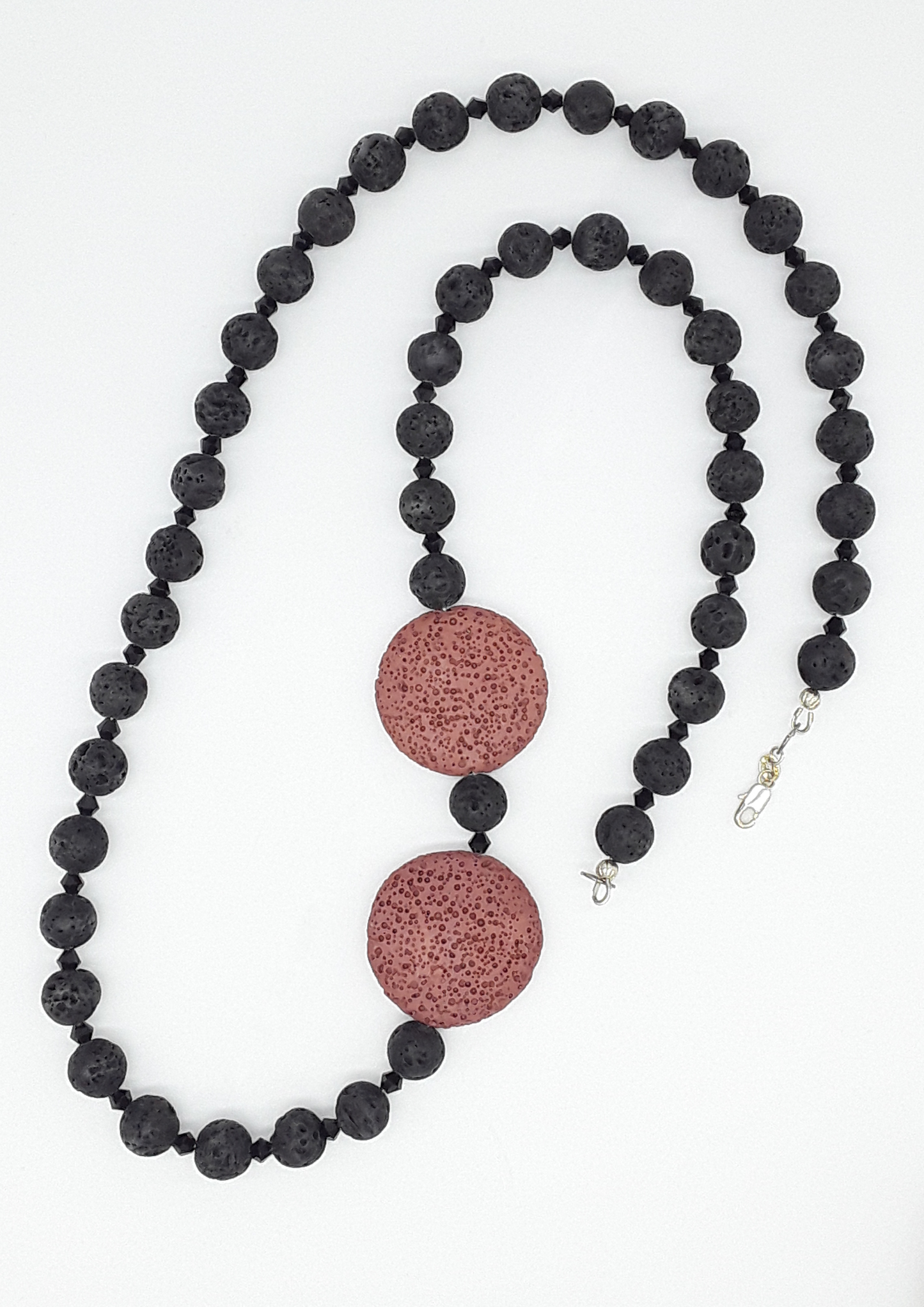 The Emberstone Necklace by Polmadeva – black and red lava stone necklace with Swarovski crystals and 925 silver symbolizing inner fire and strength