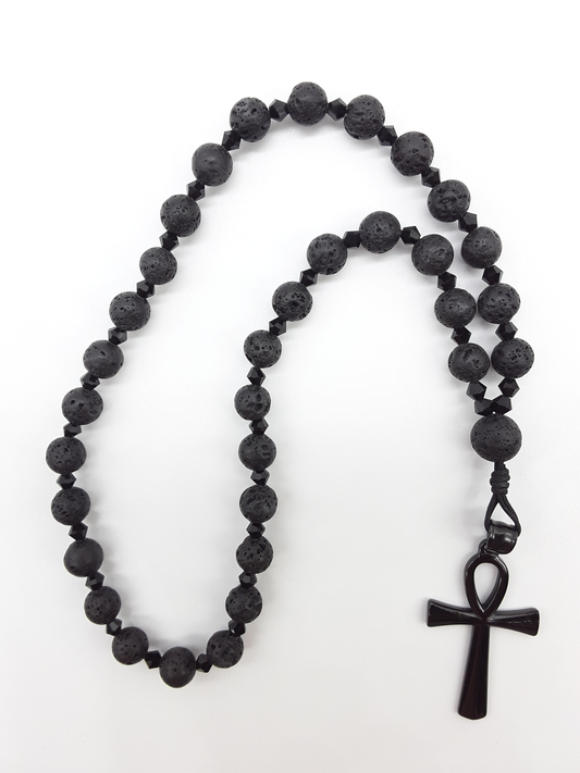 Lava and black crystal Orthodox Rosary with black stainless steel Ankh cross by Polmadeva on white background.