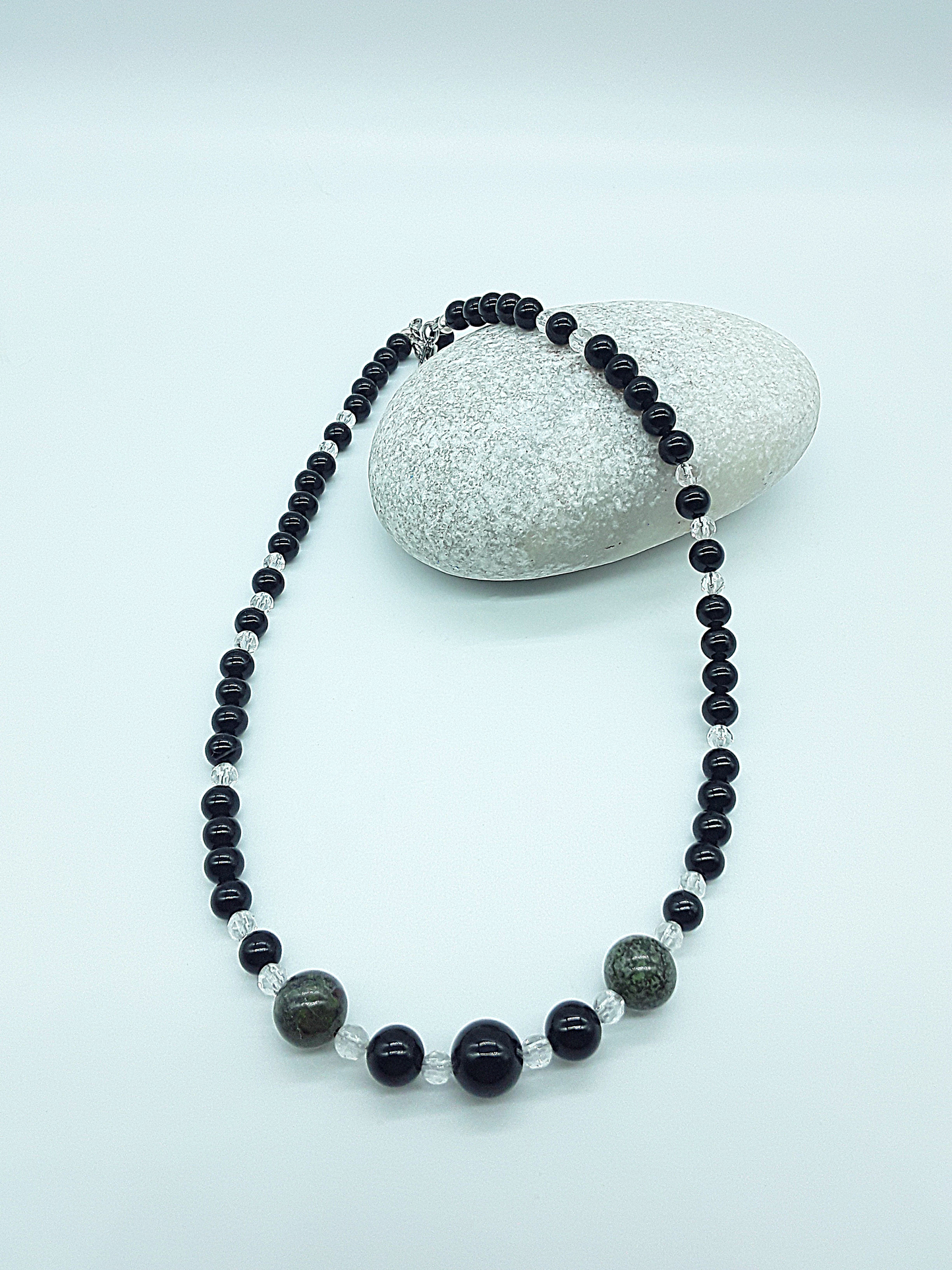 Guardian Spirit necklace with black onyx and quartz crystal beads, symbol of silent protection and presence