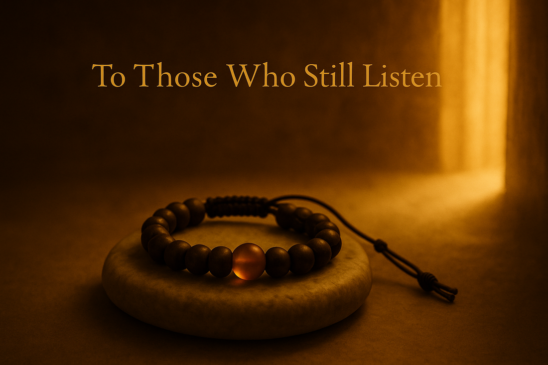 POLMADEVA - A handcrafted wooden beaded bracelet with a glowing central bead rests on a smooth stone, bathed in warm golden light. The text “To Those Who Still Listen” appears above in elegant ambient typography.