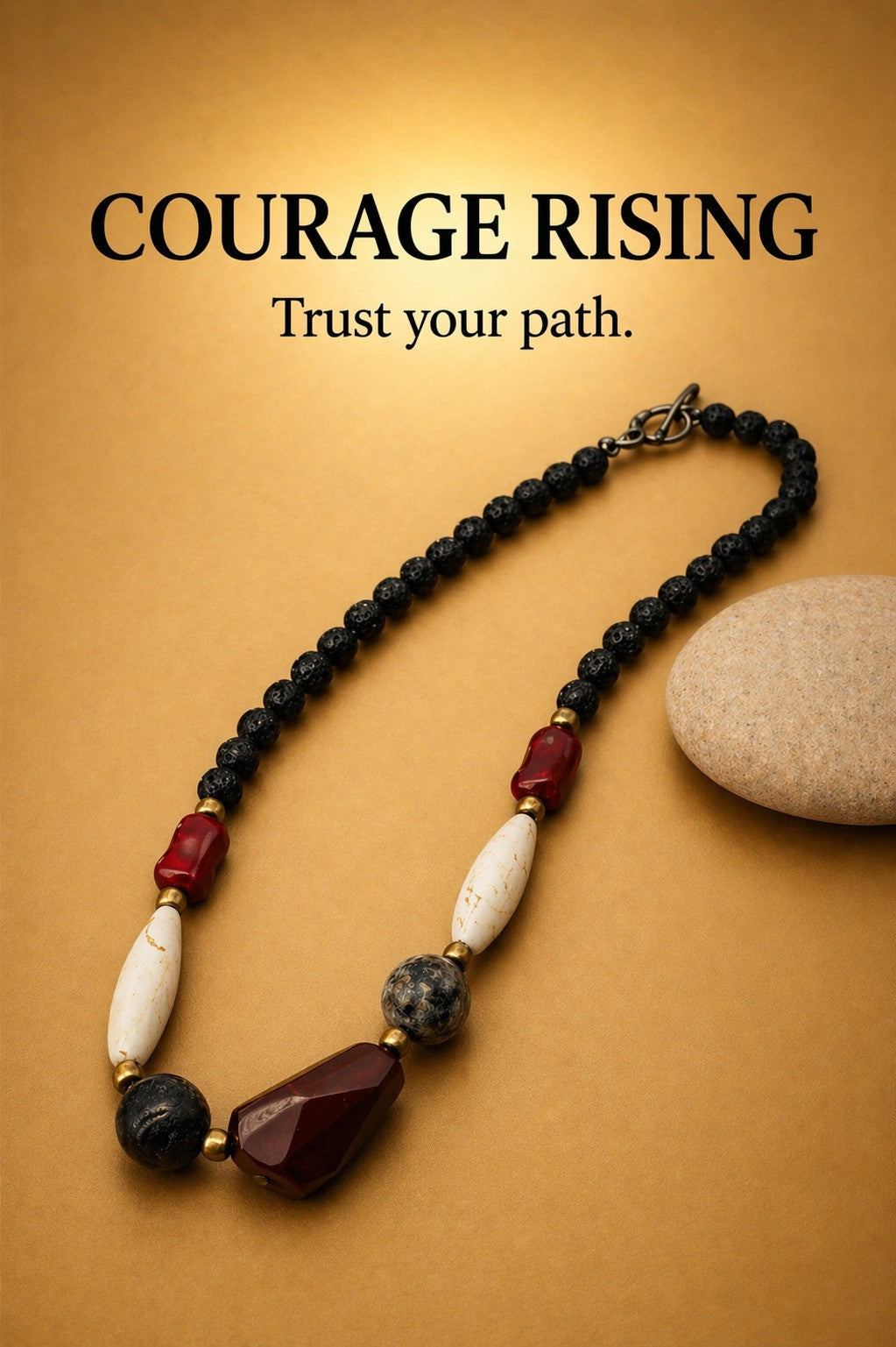 Mookaite, lava stone, red coral, turquoise, and hematite bead necklace (8–30 mm) on warm brown background — COURAGE RISING collection, “Trust your path.” by Polmadeva.