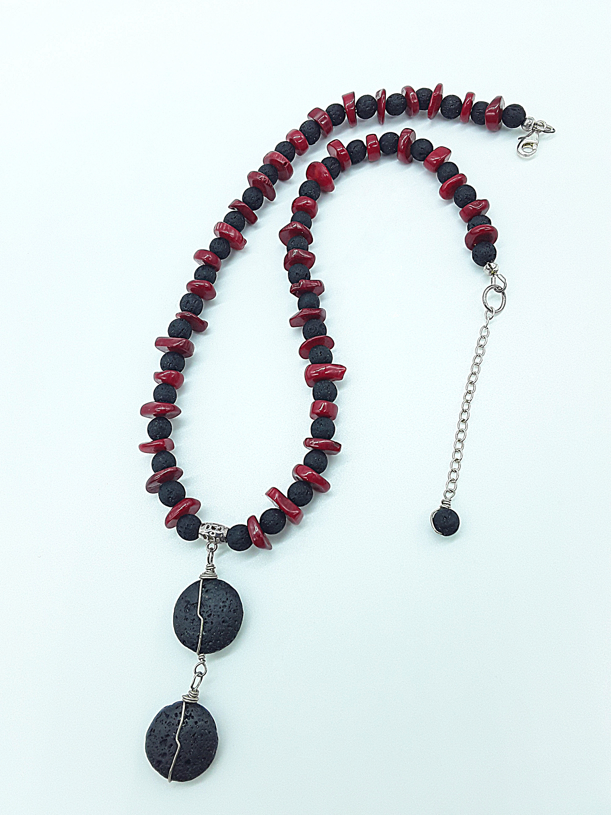 The Twin Flame Guardian Necklace by Polmadeva – lava stone, red coral and 925 silver necklace symbolizing protection, grounding, and courage