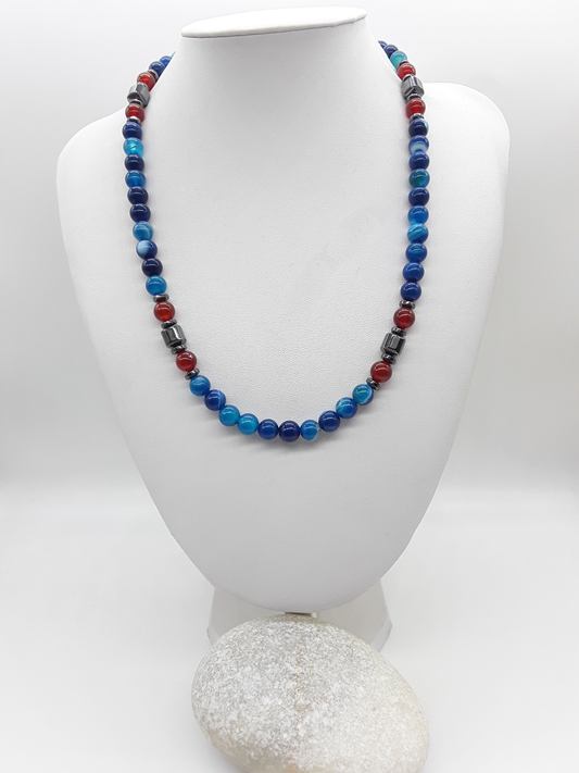 The Warrior’s Arc Necklace by Polmadeva – agate, carnelian and hematite necklace symbolizing courage, grounding, and fearless strength