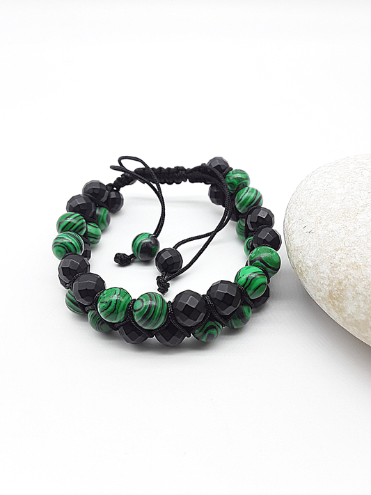 The Emerald Shadow Double Bracelet by Polmadeva – malachite and black onyx double bracelet symbolizing growth, grounding, and balanced strength