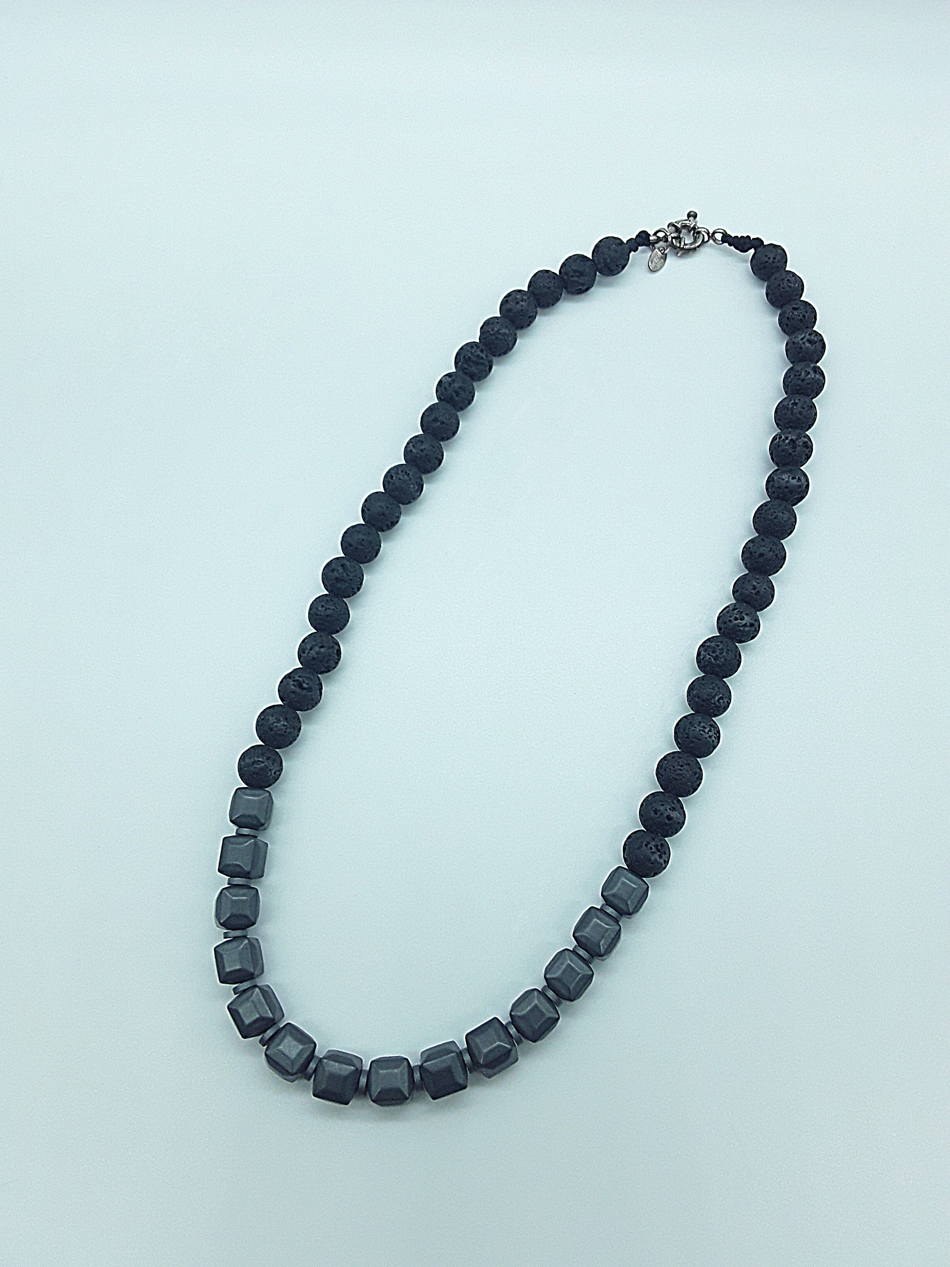The Axis Necklace by Polmadeva – lava stone, cubic hematite and 925 silver necklace symbolizing balance, grounding, and resilience