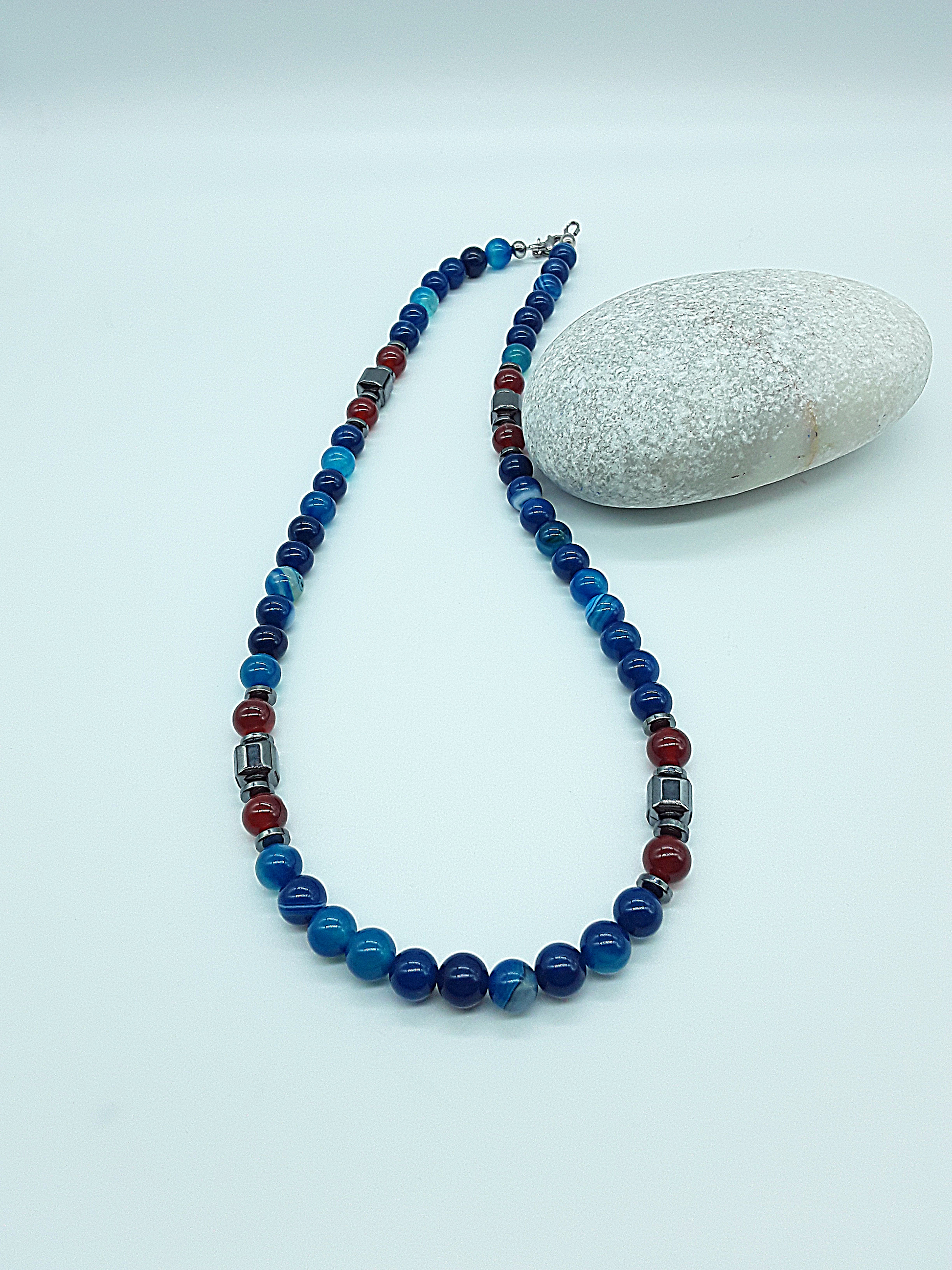 The Warrior’s Arc Necklace by Polmadeva – agate, carnelian and hematite necklace symbolizing courage, grounding, and fearless strength