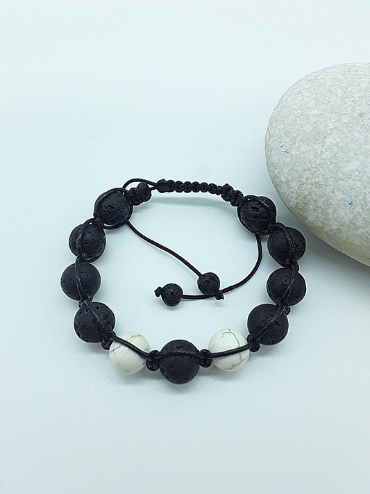 The Silent Guardian Bracelet by Polmadeva – lava stone and magnesite bracelet symbolizing protection, clarity, and resilience