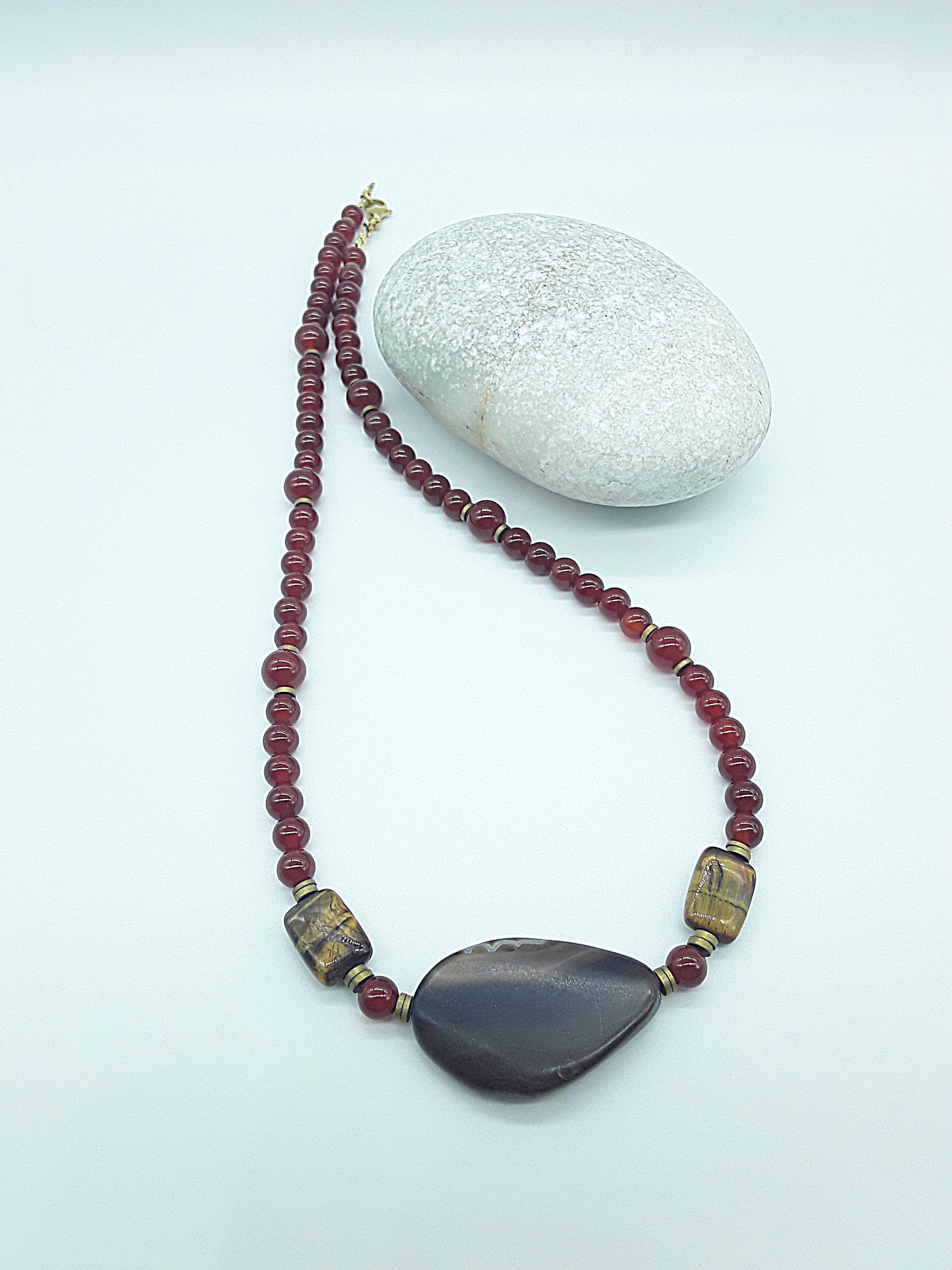 The Ember Grace Necklace by Polmadeva – carnelian, tiger’s eye, and agate necklace symbolizing courage, clarity, and graceful strength