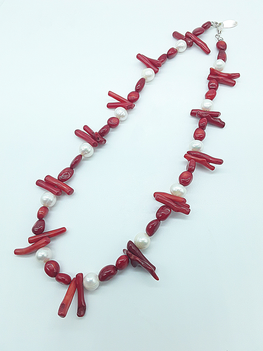 The Coral Grace Necklace by Polmadeva – red coral and freshwater pearl necklace symbolizing passion, serenity, and elegant strength