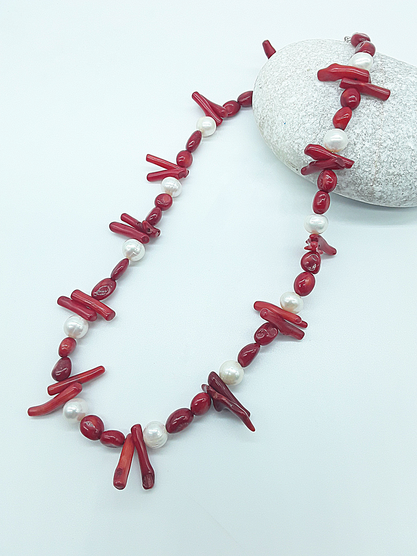 The Coral Grace Necklace by Polmadeva – red coral and freshwater pearl necklace symbolizing passion, serenity, and elegant strength