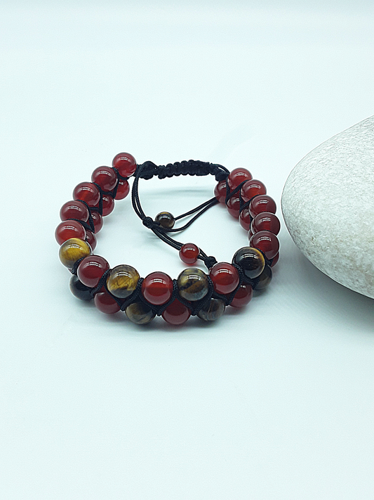 The Flame & Stone Double Bracelet by Polmadeva – carnelian and tiger’s eye double-strand bracelet symbolizing courage, focus, and strength