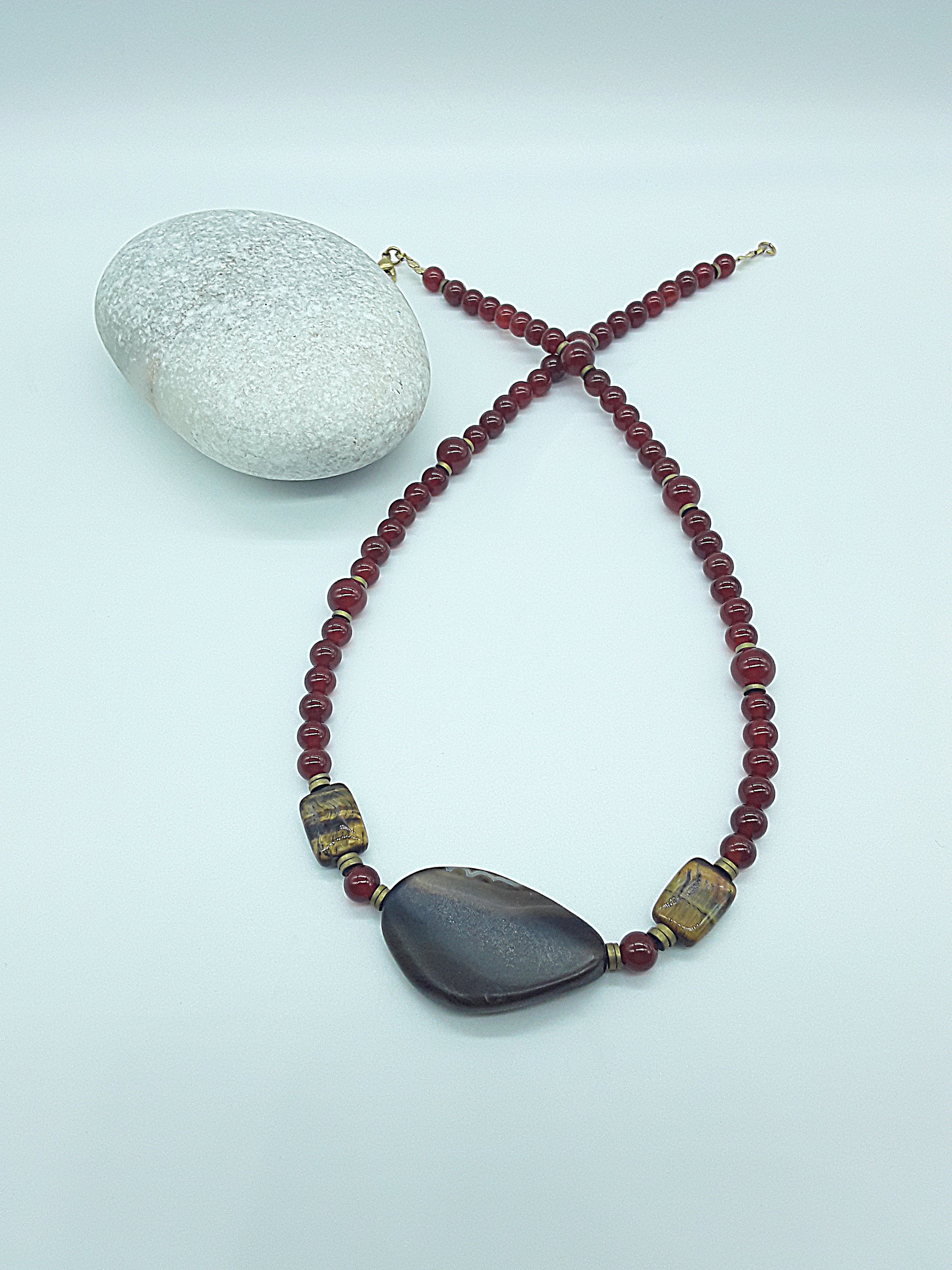The Ember Grace Necklace by Polmadeva – carnelian, tiger’s eye, and agate necklace symbolizing courage, clarity, and graceful strength