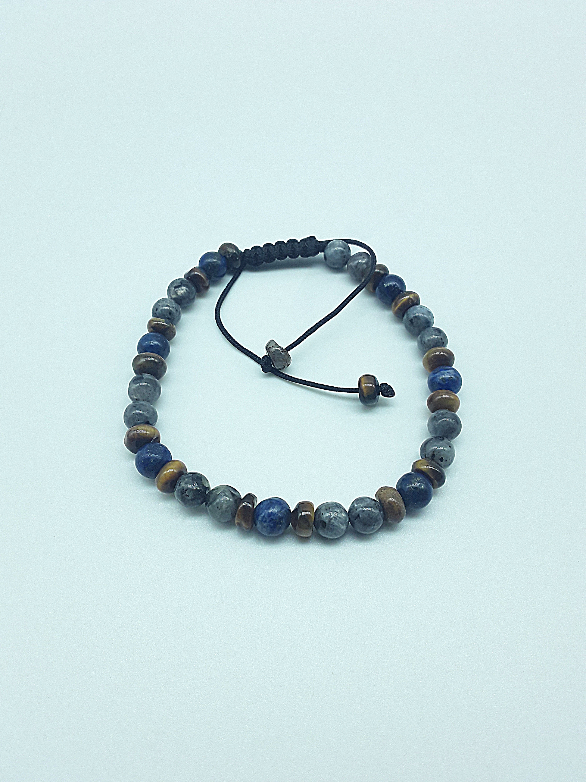 The Stone Whisper Bracelet by Polmadeva – handcrafted with Labradorite, Lapis Lazuli & Tiger’s Eye (6 mm). Adjustable 18–24 cm. A talisman of grounding, wisdom & quiet strength.