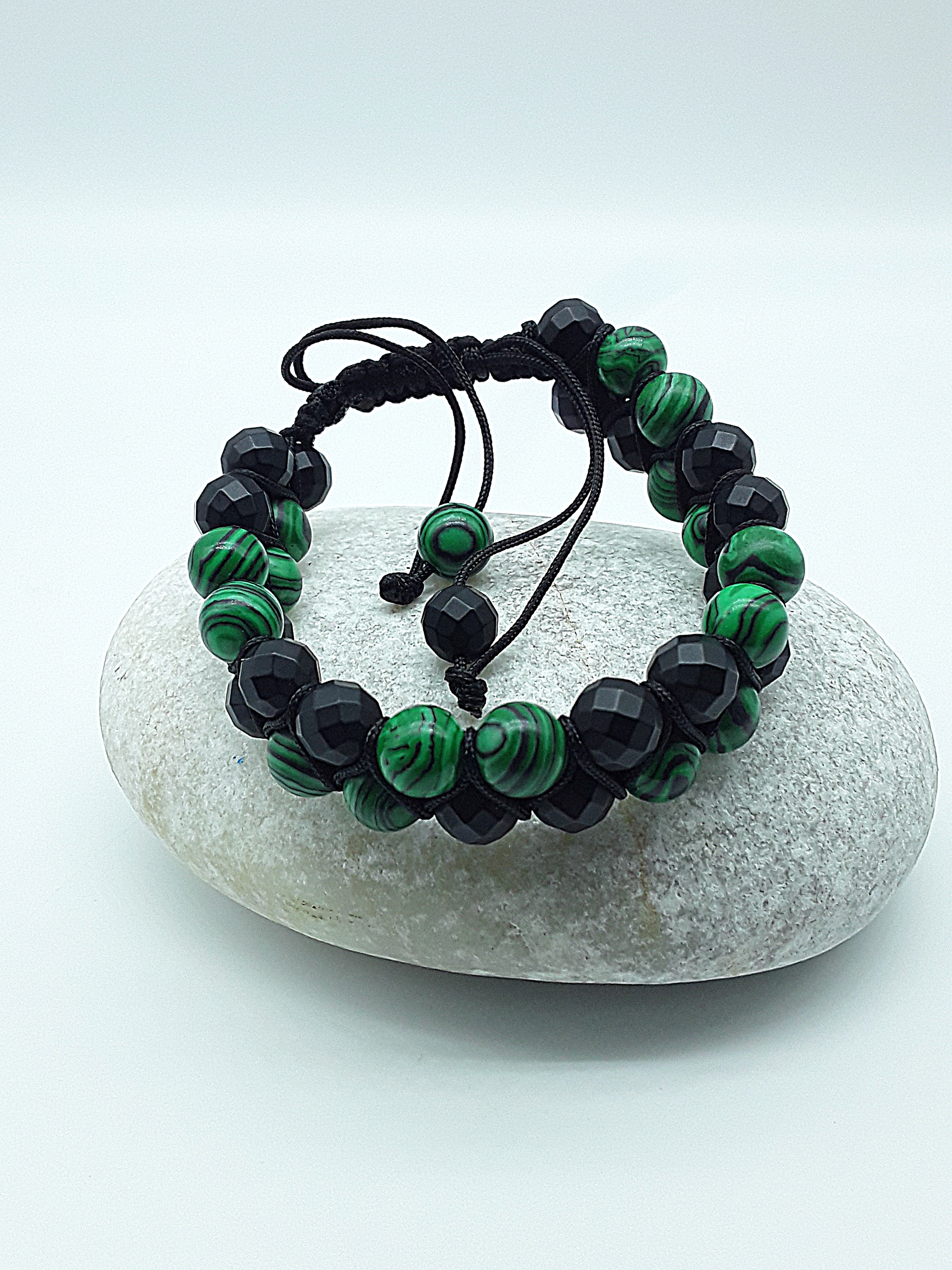 The Emerald Shadow Double Bracelet by Polmadeva – malachite and black onyx double bracelet symbolizing growth, grounding, and balanced strength