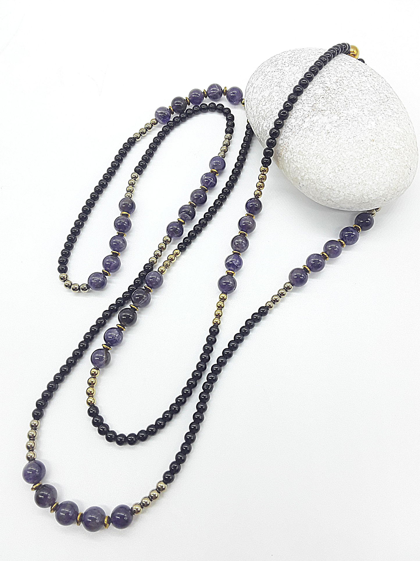 The Graceful Flow Necklace by Polmadeva – amethyst, black onyx and hematite necklace symbolizing calm strength, balance, and resilience