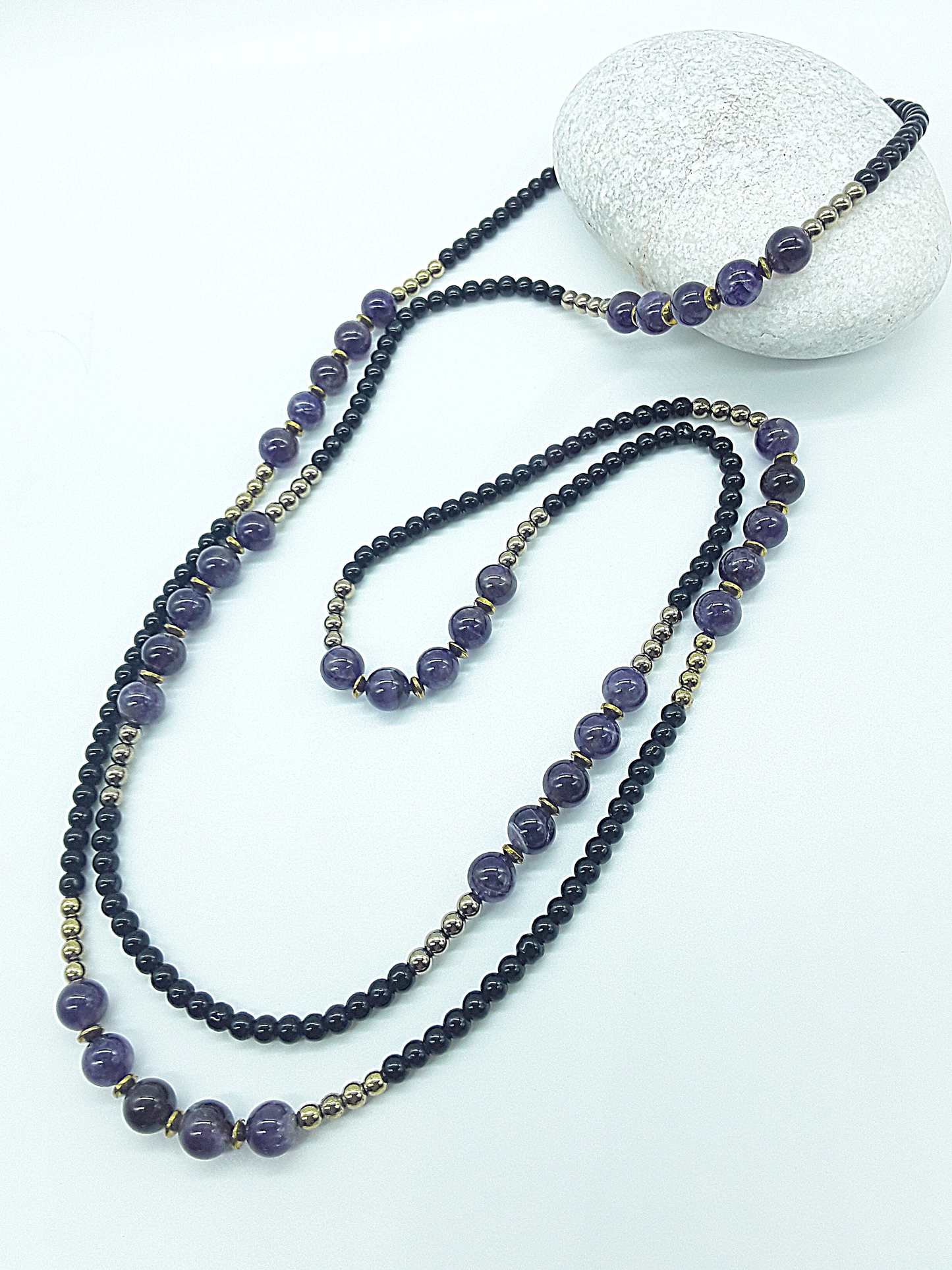The Graceful Flow Necklace by Polmadeva – amethyst, black onyx and hematite necklace symbolizing calm strength, balance, and resilience