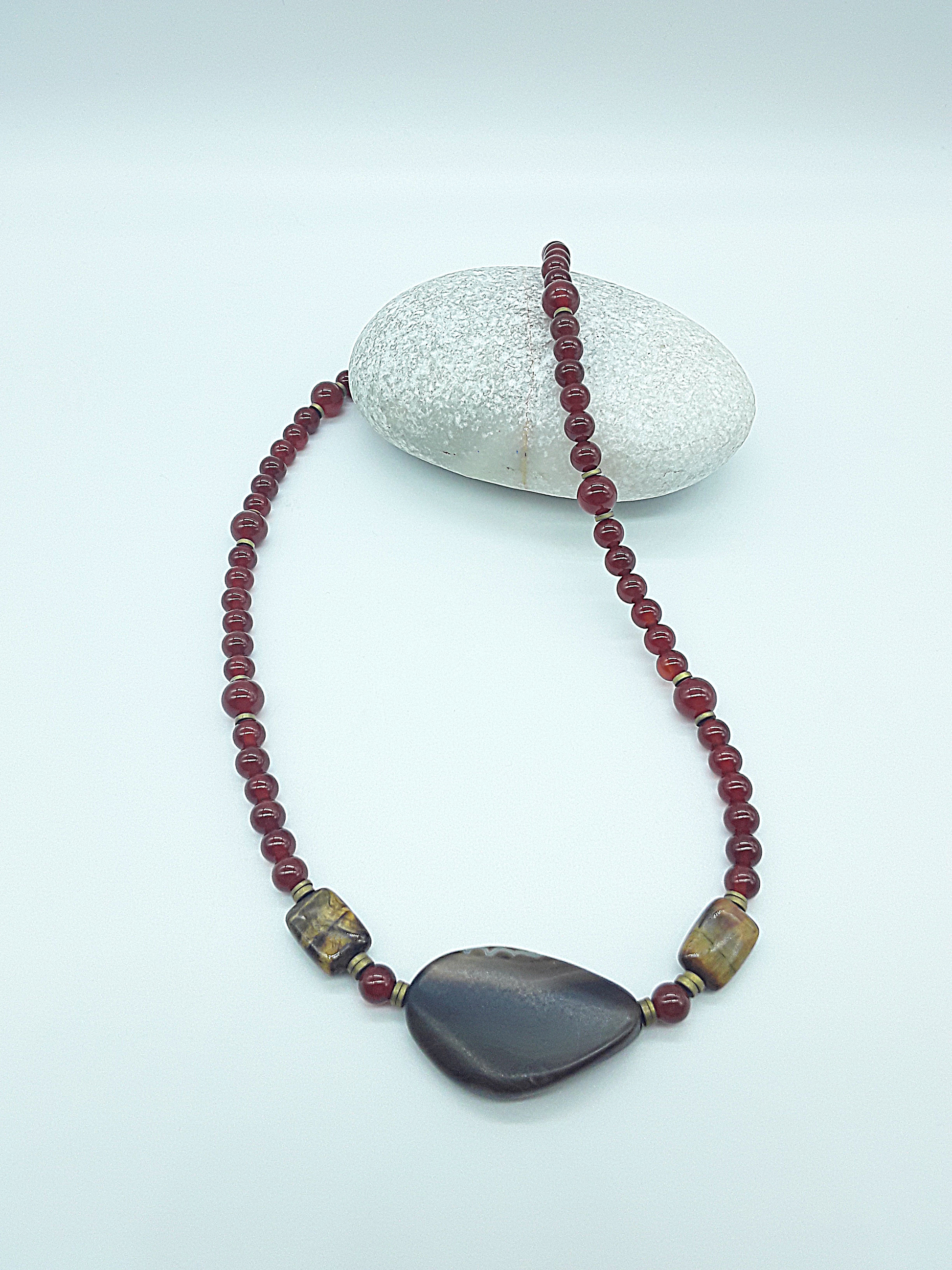 The Ember Grace Necklace by Polmadeva – carnelian, tiger’s eye, and agate necklace symbolizing courage, clarity, and graceful strength