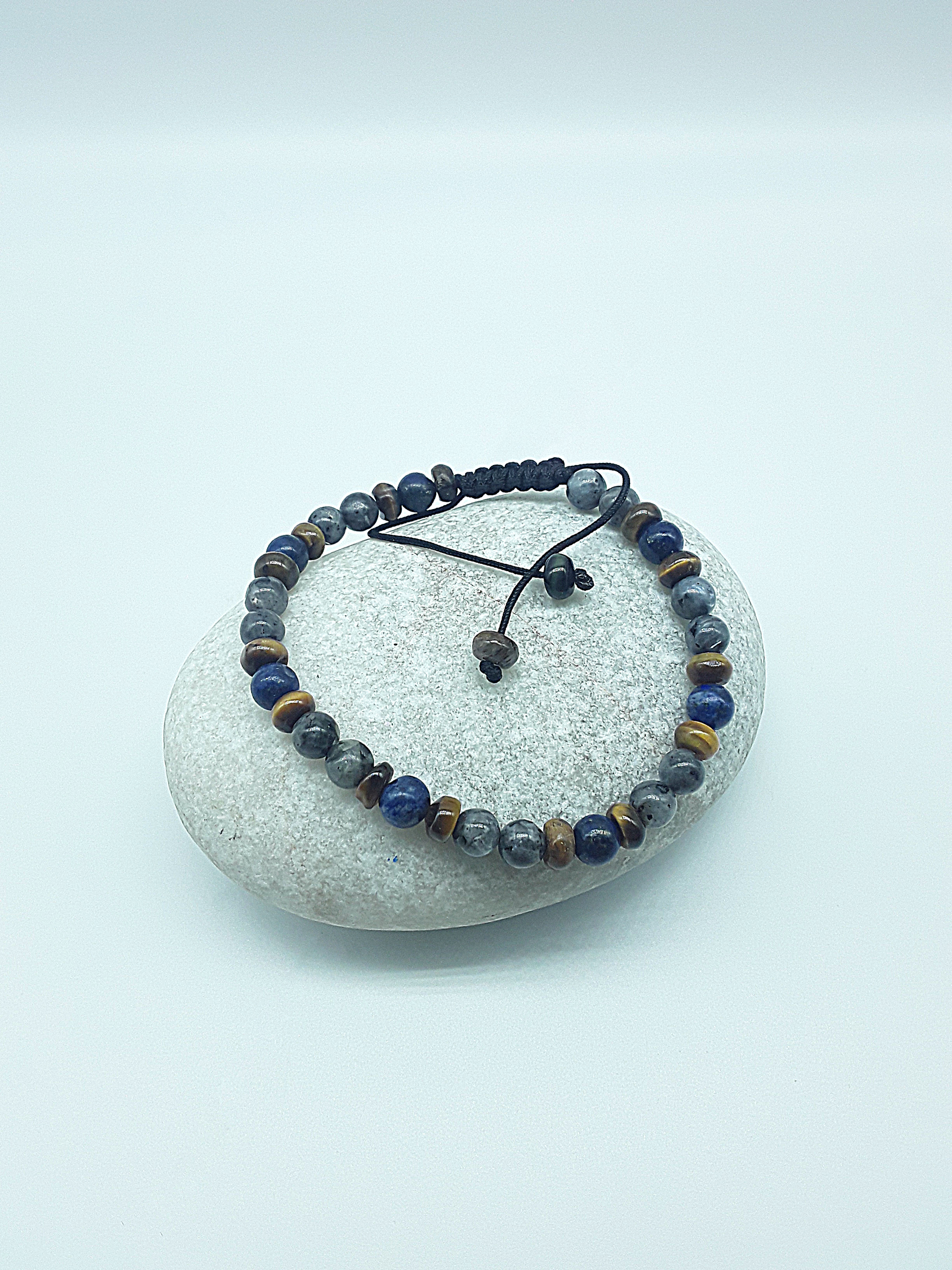 The Stone Whisper Bracelet by Polmadeva – handcrafted with Labradorite, Lapis Lazuli & Tiger’s Eye (6 mm). Adjustable 18–24 cm. A talisman of grounding, wisdom & quiet strength.