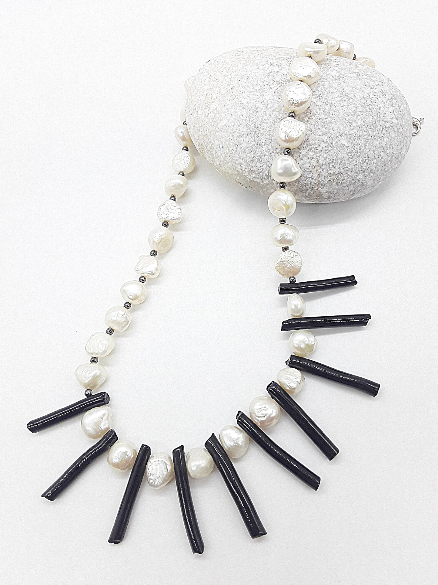 The Tidesong Necklace by Polmadeva – freshwater pearl, black coral and 925 silver necklace symbolizing elegance, strength, and balance