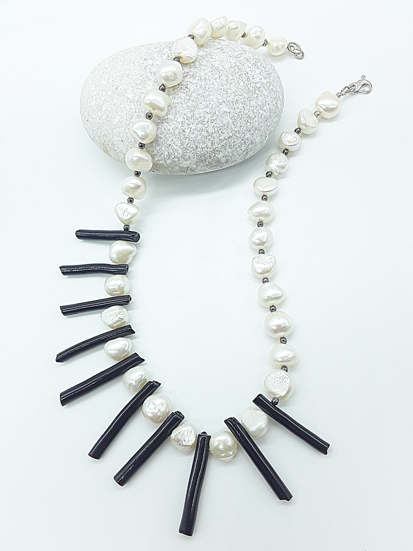 The Tidesong Necklace by Polmadeva – freshwater pearl, black coral and 925 silver necklace symbolizing elegance, strength, and balance