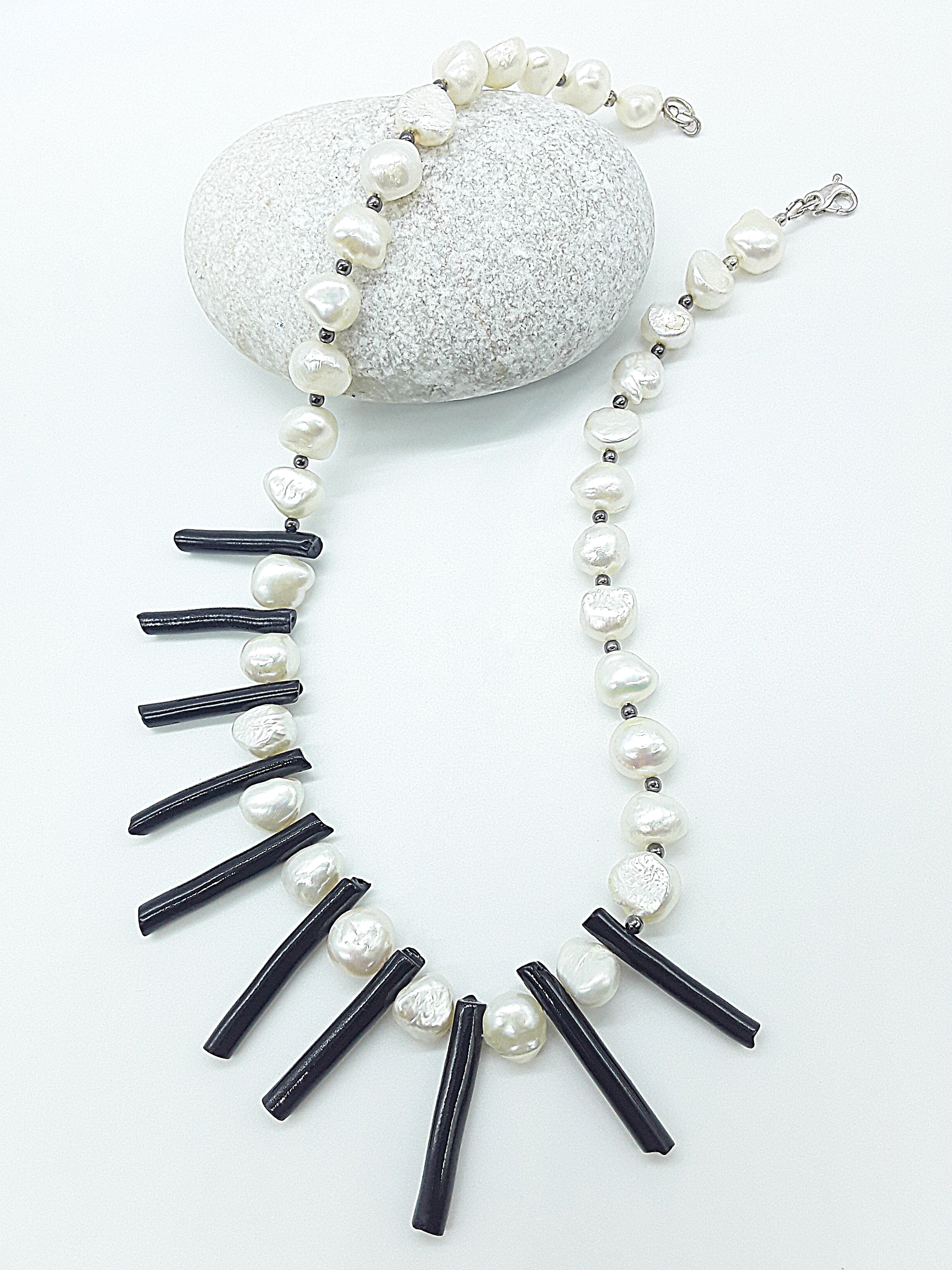 The Tidesong Necklace by Polmadeva – freshwater pearl, black coral and 925 silver necklace symbolizing elegance, strength, and balance