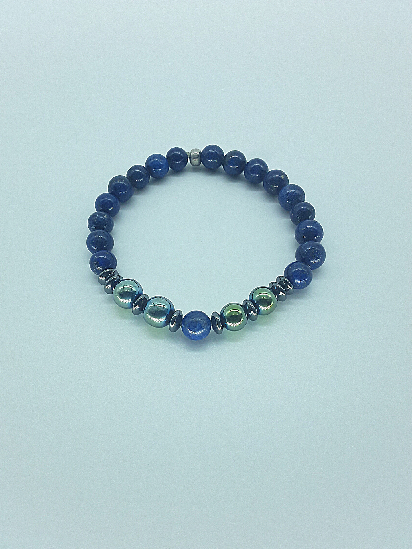 The Inner Compass Bracelet by Polmadeva – handcrafted with Lapis Lazuli & Hematite beads (8 mm). Adjustable 18–24 cm. A talisman of grounding & inner vision.