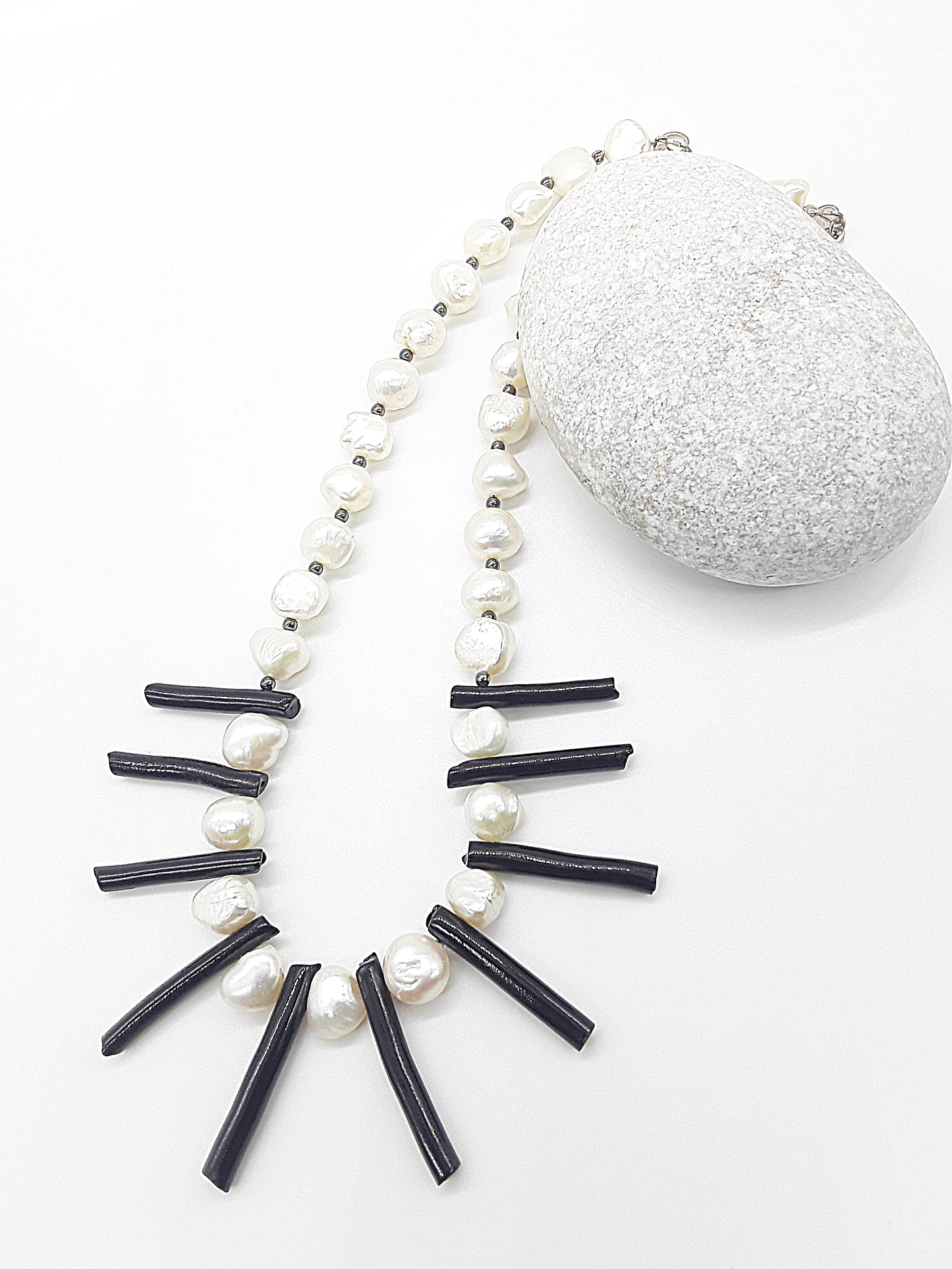 The Tidesong Necklace by Polmadeva – freshwater pearl, black coral and 925 silver necklace symbolizing elegance, strength, and balance
