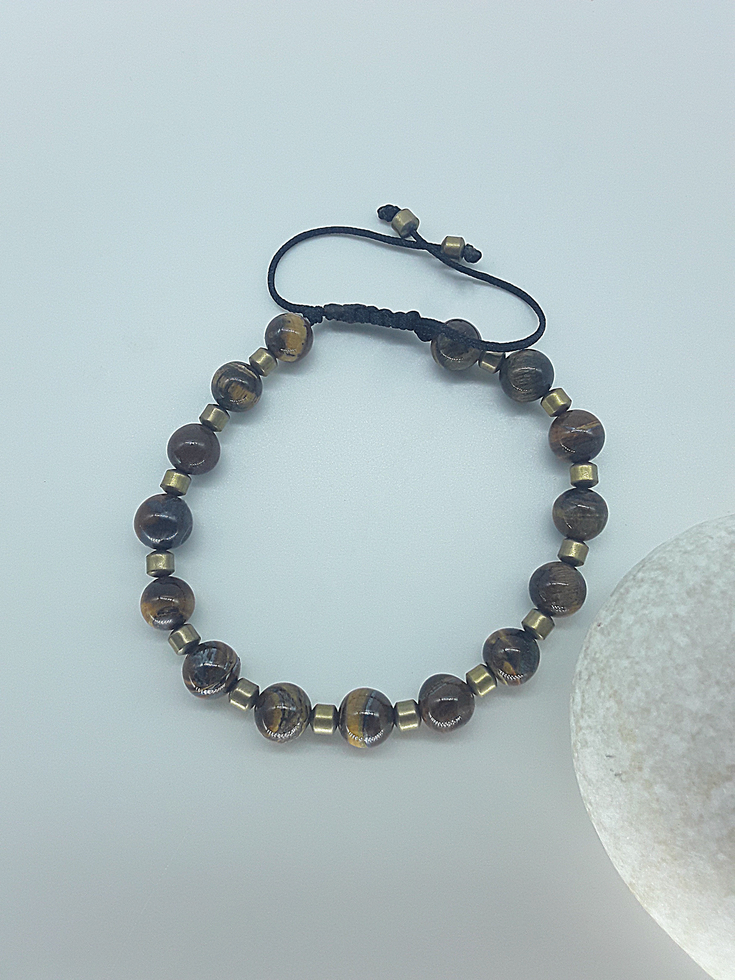 The Emberheart Bracelet by Polmadeva – tiger eye and hematite adjustable bracelet symbolizing courage, balance, and resilience