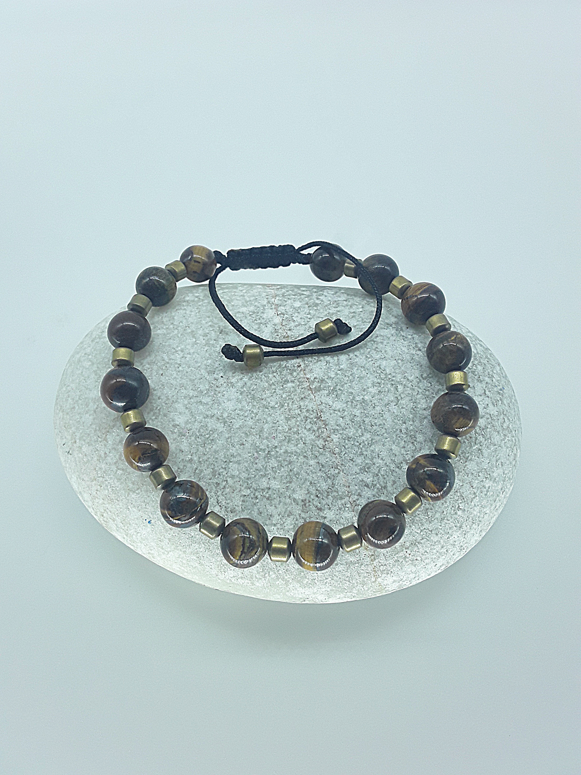 The Emberheart Bracelet by Polmadeva – tiger eye and hematite adjustable bracelet symbolizing courage, balance, and resilience