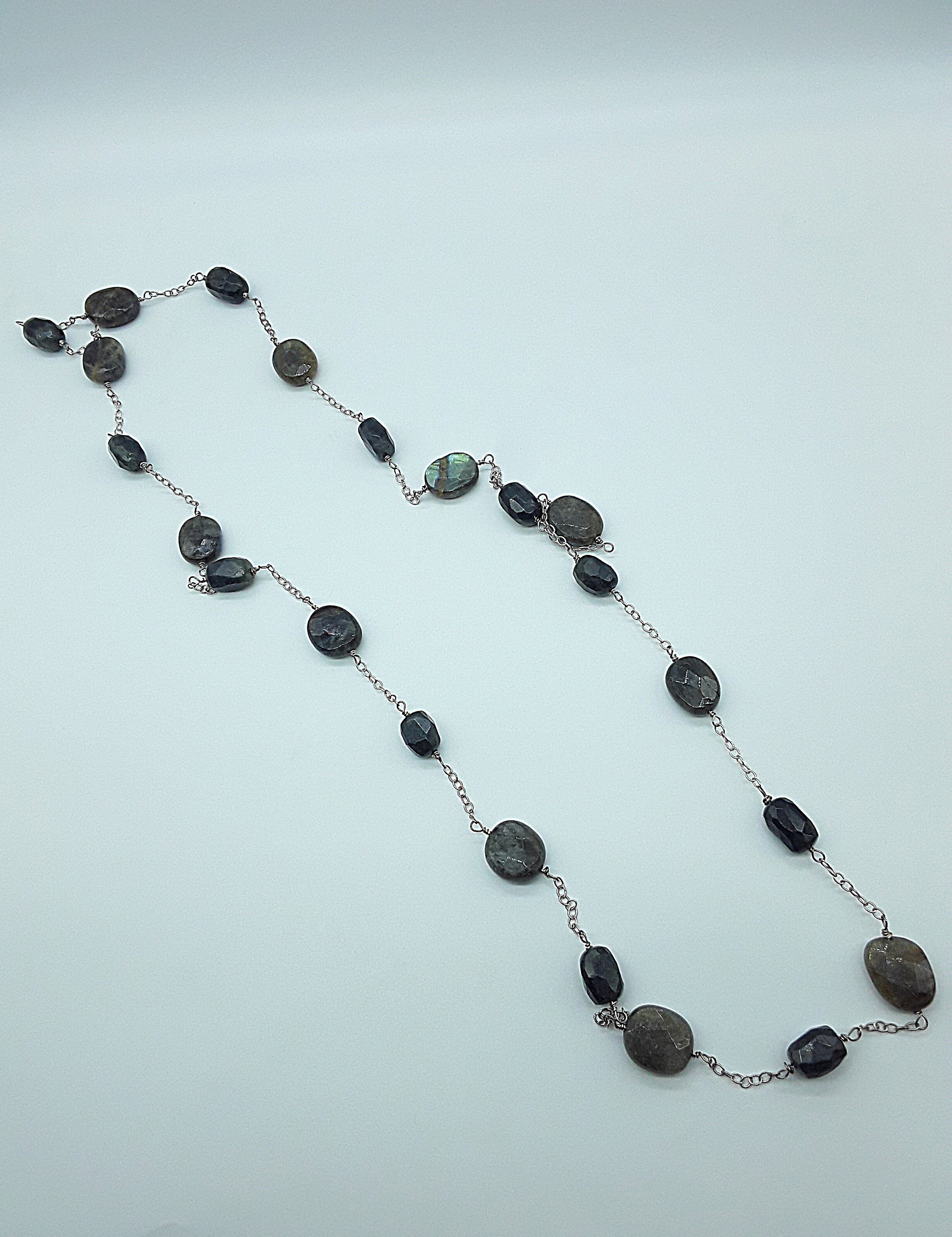 Infinity Dawn Necklace by Polmadeva – 100 cm labradorite and 925 silver necklace symbolizing renewal and elegance.