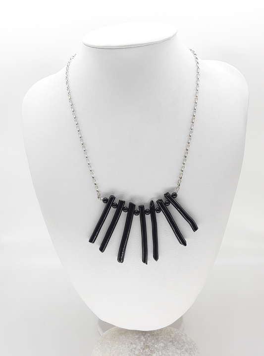 The Black Fang Necklace by Polmadeva – black coral and 925 silver necklace symbolizing protection, grounding, and timeless strength