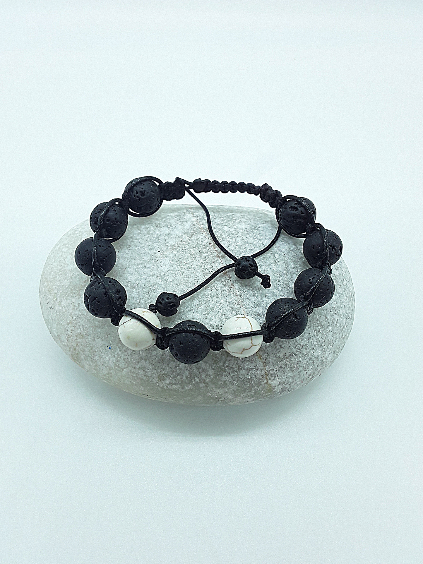 The Silent Guardian Bracelet by Polmadeva – lava stone and magnesite bracelet symbolizing protection, clarity, and resilience
