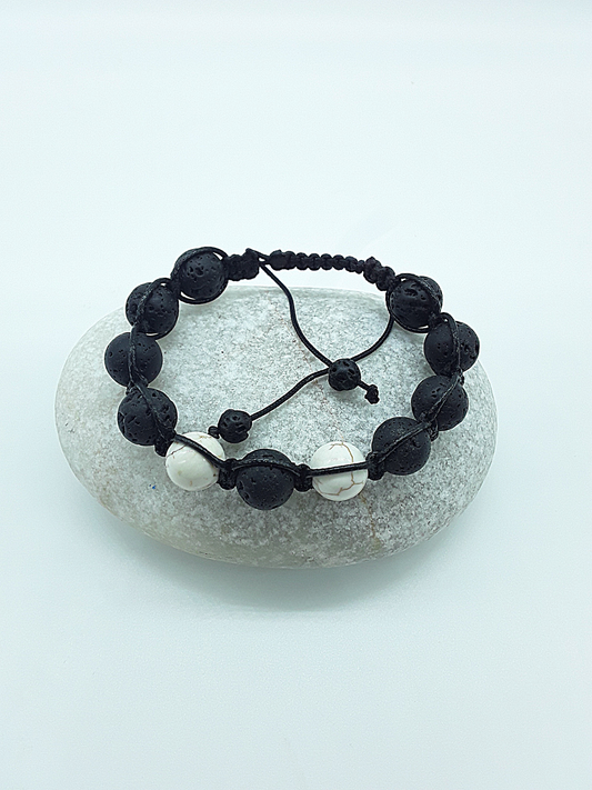 The Silent Guardian Bracelet by Polmadeva – lava stone and magnesite bracelet symbolizing protection, clarity, and resilience