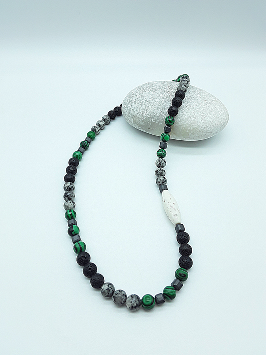 The Silent Strength Necklace by Polmadeva – malachite, lava stone, jasper, hematite and turquoise necklace symbolizing inner power, grounding, and resilience