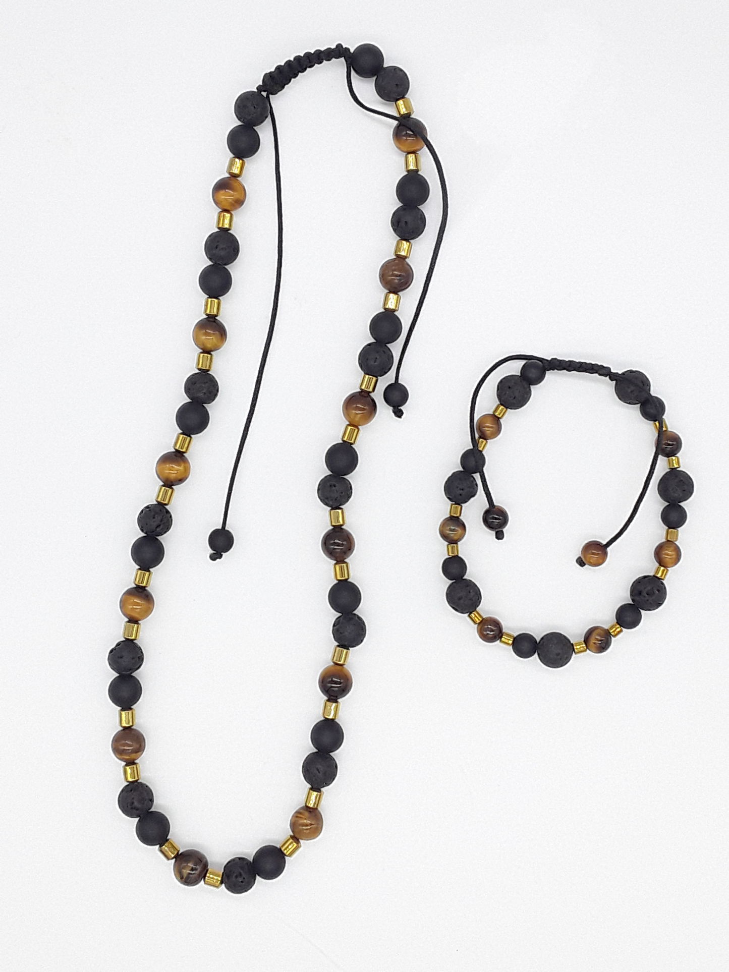 The Fourfold Vision Set by Polmadeva – handcrafted necklace & bracelet with Lava Stone, Tiger’s Eye, Black Onyx & Hematite, symbolizing balance, clarity & endurance.