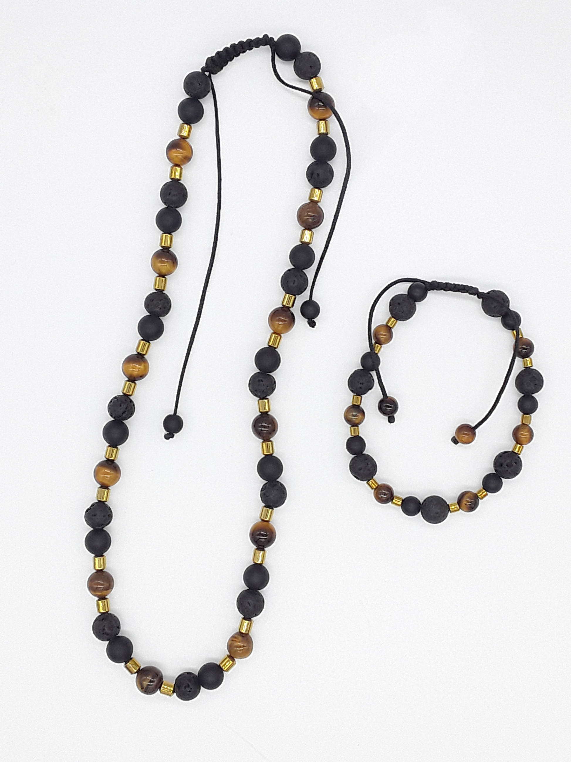 The Fourfold Vision Set by Polmadeva – handcrafted necklace & bracelet with Lava Stone, Tiger’s Eye, Black Onyx & Hematite, symbolizing balance, clarity & endurance.